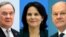 Olaf Scholz (dreapta) este principalul candidat în cursa pentru viitorul cancelar al Germaniei. Alături de el se află Armin Laschet (stânga), candidatul nominalizat de Uniunea Creștin Democrată, și Annalena Baerbock (centru), candidată din partea Partidului Ecologic German.