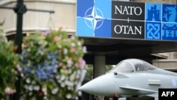 A full-sized model of a Typhoon fighter jet is displayed in the Celtic Manor Hotel in Newport, South Wales, on September 3, ahead of the summit's opening.
