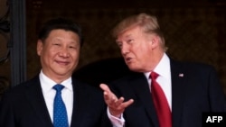 U.S. President Donald Trump (right) welcomes Chinese President Xi Jinping to the Mar-a-Lago estate in West Palm Beach, Florida, on April 6.