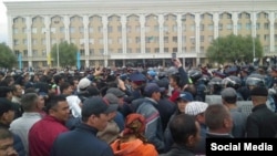 Kazakhs gather in the center of the southern town of Kyzylorda to protest proposed land sales on May 1.