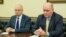 Russian Deputy Foreign Minister Grigory Karasin (right) has vowed a "tough" response.