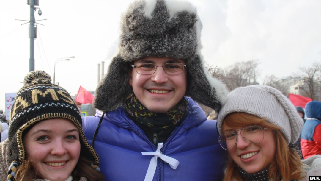 Vitaly, a banking consultant, attended the rally with friends.