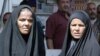 Iraqi women at the site of the August 30 Baghdad market bombing