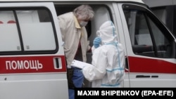 Супровід інфікованої жінки до лікарні, Москва, 14 липня 2020 року
