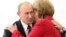 Уладзімер Пуцін і Ангела Мэркель