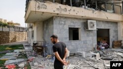 یک خانه ویران‌شده در شهر اسرائیلی کریات شمونا بر اثر اصابت راکت‌های حزب‌الله