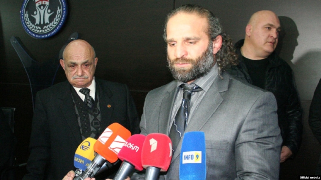 The allegations center on two-time world champion Luka Kurtanidze (center), who is accused of viciously beating up his deputy, Temur Kazarashvili, as well as prominent wrestler Raindi Abramishvili.