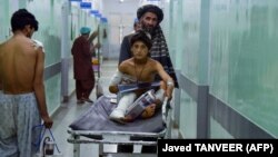 آرشیف، کودکان زخم برداشته در نتیجه انفجار ماین کنار جاده در کندهار