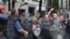 SERBIA - Extreme nationalists scuffle with police officers during a protest in Belgrade, Serbia, Wednesday, May 29, 2019