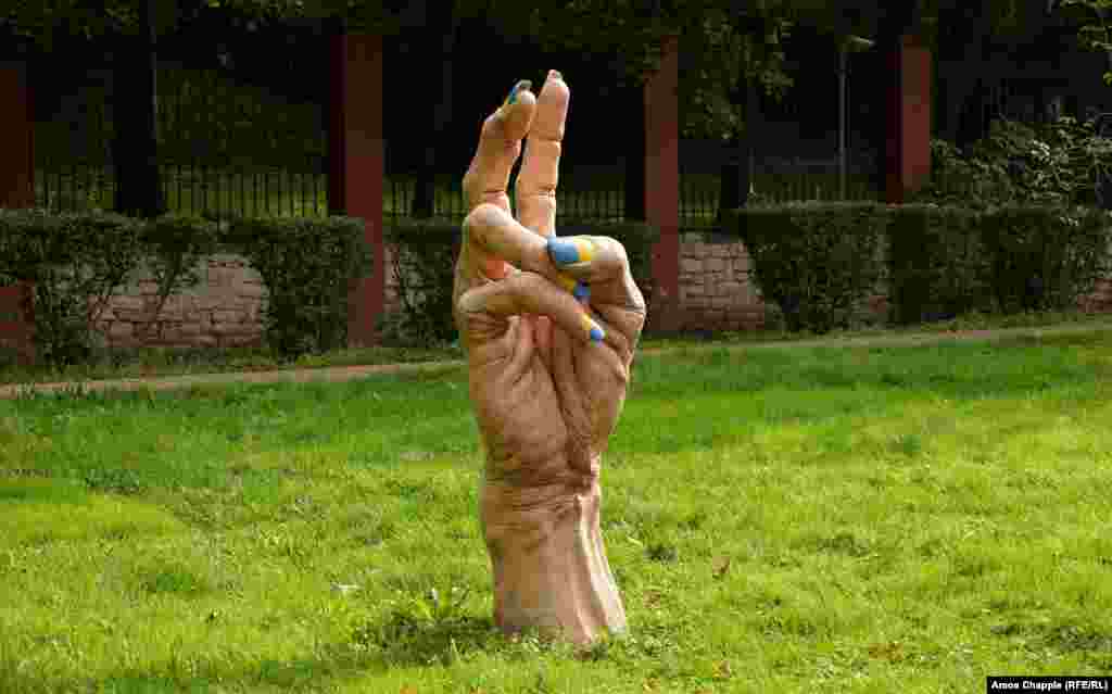 A protest sculpture by Jan Slovencik in a park outside the Russian Embassy in Prague, Czech Republic, photographed in October 2025.