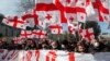 Protesters march in support of Georgian opposition leader Nika Melia in Tbilisi on February 26.