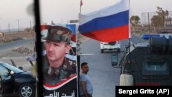 Патруль российской военной полиции в Сирии