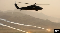 A U.S. Army Blackhawk helicopter flies in Afghanistan's Kandahar Province on March 25.