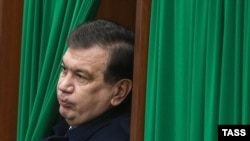 Uzbekistan's acting president, Shavkat Mirziyaev at a polling station in Tashkent on December 4.