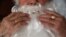 Almaty, Kazakhstan - Dmitry Slektor, 71, a pensioner who worked as a mechanic at a glass factory, poses for a photograph dressed as Santa Claus in his apartment