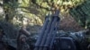 Военнослужащий 15-й бригады «Кара-Даг» оперативного назначения НГУ готовится к обстрелу российских войск из ракетной установки «Град-П „Партизан“»