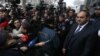 Armenia - Prosecutor-General Artur Davtian (R) addresses protesters outisde his office in Yerevan, December 24, 2018.