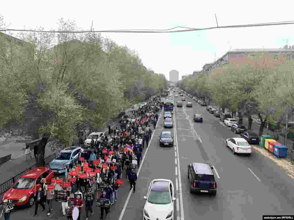 Members of an Armenian political opposition movement march through Yerevan during the summit on May 4.