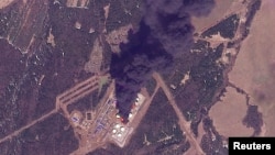 A PlanetLabs satellite image shows smoke rising following a Ukrainian drone attack on an oil pumping station in Russia's Perm region on April 29.