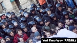 Russian police break up a rally in support of free assembly in Moscow. 