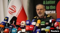 Iranian Revolutionary Guards spokesperson Hossein Mohebbi speaks during a press conference in Tehran on September 29.