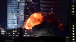 An explosion rocks central Tel Aviv on June 13. Further strikes were seen early on June 14.