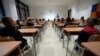 SERBIA -- A teacher speaks to students on their first day back, at a primary school, in the village of Belegis, 25 kilometers west of Belgrade, Septtember 1, 2021