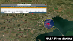 Скриншот с сайта сервиса NASA Firms, на котором зафиксирован пожар в порту Керчи