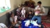  'Not Enough Mother's Milk': The Struggling Parents Of Tajikistan's First Quintuplets video grab 3