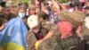 WATCH: Orthodox Procession Scuffles With Protesters Near Kyiv