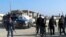 Gunmen walk the streets of the Iraqi city of Ramadi,which has been plagued by violence in recent weeks. 