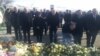 Armenia - Members of the Russian State Duma lay flowers on the graves of the seven members of an Armenian family killed in Gyumri, 23Jan2015.