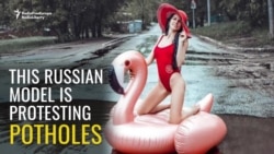 Russian Model Poses To Protest Potholes
