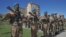 Azerbaijani servicemen take part in a parade in Susa/Shushi on September 27. 