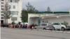 Turkmenistan. Shop number 4 in the 11th microdistrict in Ashgabat. People are waiting for products. On other days, a number of stores sold individual products: some sugar, some thighs, but not enough for everyone. May 1, 2021