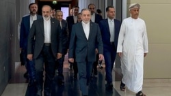 Iranian Foreign Minister Abbas Araqchi (center) arrives for a meeting with US representatives in Muscat, Oman, on February 6. 