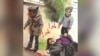 Afghanistan - a drawing of two children with their injured mother after a bombing in Kabul, based on a video from the scene of the bombing.