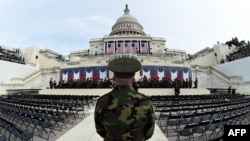 The United States Marine Corps Band practices on January 19 in front of the podium at the Capitol Building where U.S. President-elect Donald Trump was to take the oath of office and be sworn in as the 45th U.S. president in Washington.