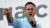 Russian opposition activist Alexei Navalny gestures while speaking to a crowd during a political protest in Moscow on July 20. 