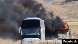 Armenia -- A passenger bus burns near the town of Vartenis after what the Armenian Defense Ministry described as an Azerbaijani air strike, September 29, 2020.