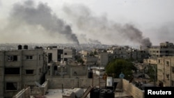 Tym i zi ngrihet lart pas sulmeve izraelite në Rafah, Gazë, 28 maj 2024.