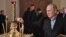 Russian President Vladimir Putin attends a Christmas service in a church in St. Petersburg late on the night of January 6-7.