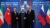 President Vladimir Putin of Russia, Hassan Rouhani of Iran and Tayyip Erdogan of Turkey meet in Tehran, Iran September 7, 2018. Cem Oksuz/Turkish Presidential Palace