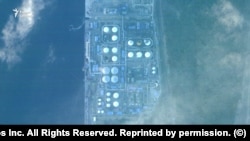 Нафтобаза в порту Усть-Луга, Ленінградська область, Росія, на супутниковому знімку Planet.com, зробленому 1 квітня, після низки українських ударів