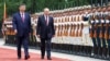 Russian President Vladimir Putin and Chinese President Xi Jinping inspect an honour guard during a welcome ceremony at the Great Hall of the People in Beijing on May 20.