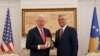 KOSOVO -- Kosovar President Hashim Thaci (R) decorates with the medal 'The order of freedom' the former U.S. president Bill Clinton during their meeting in Pristina, June 11, 2019