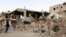 Houses destroyed by air strikes in Yemen's capital Sanaa