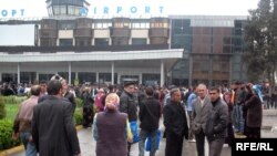 Tajikistan - Tens of passengers waiting to fly to Russia in Dushanbe airport at 29Mar2010