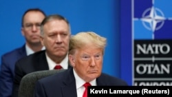 U.S. President Donald Trump, U.S. Secretary of State Mike Pompeo and Acting White House Chief of Staff Mick Mulvaney attend a North Atlantic Treaty Organization Plenary Session at the NATO summit in Watford, December 4, 2019