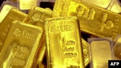 Золото в слитках. Иллюстративное фото